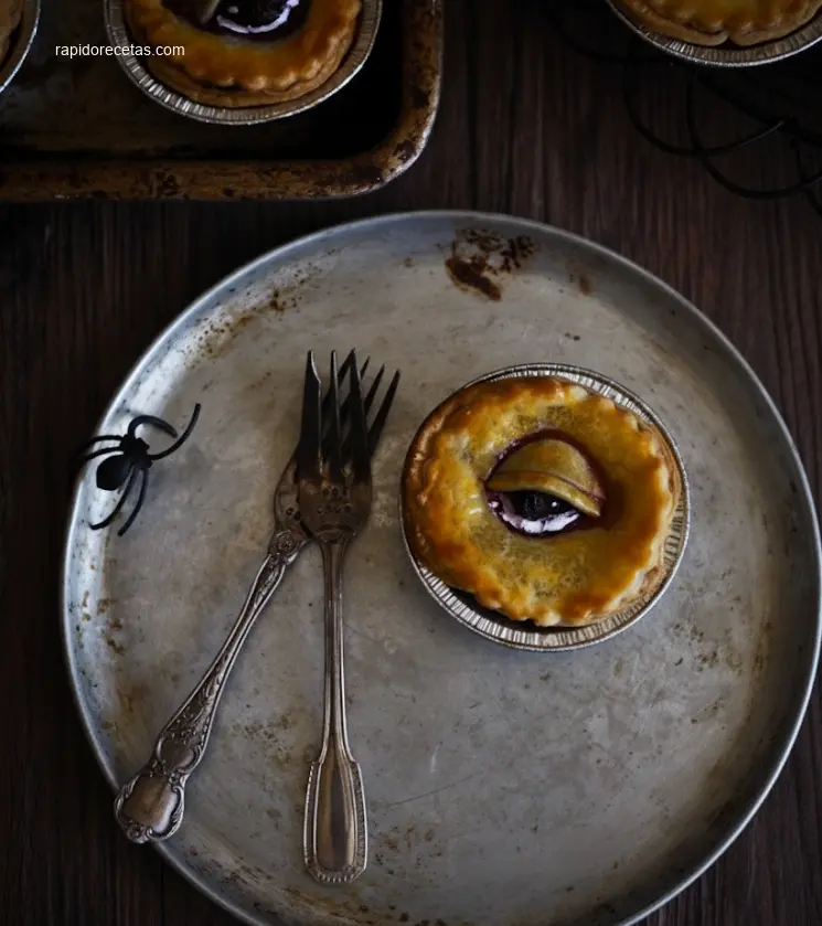 Creepy Eye Pies: 6 Must-Try Spooky Treats 7 Creepy Eye Pies on a white platter for Halloween