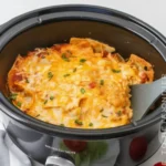 Warm Crockpot Chicken Enchilada Casserole served meal