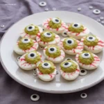 Spooky Halloween Eyeball Deviled Eggs: 3 Recipes. 5 45 degree shot of Spooky Halloween Eyeball Deviled Eggs