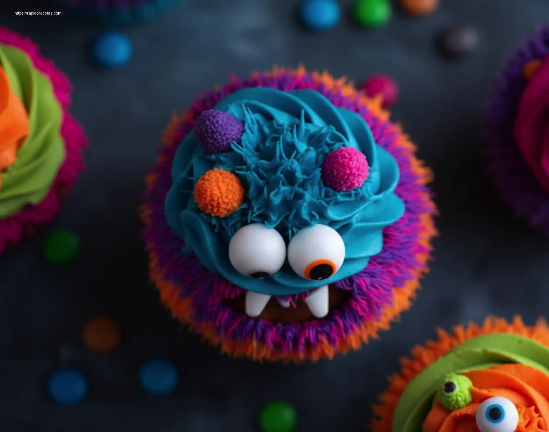 Close-up 45-degree view of two vibrant Monster Cupcakes.