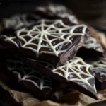 Webbed Chocolate Bark: 4 Must-Try Dessert Hacks 3 Delicious Webbed Chocolate Bark pieces on a white platter.