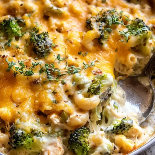 Chicken Broccoli Casserole: Our Top 3 Recipes 2 A warm, bubbly chicken broccoli casserole in a white baking dish.