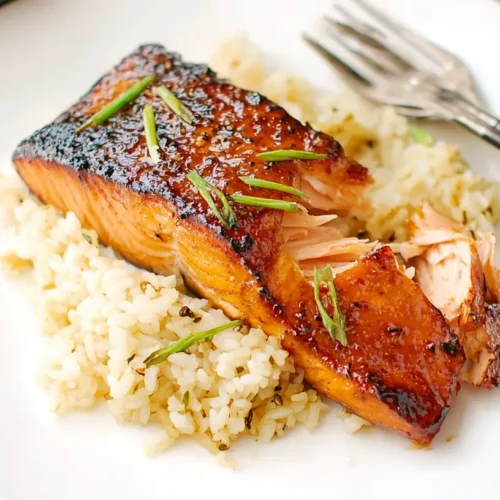 A beautifully seared miso salmon fillet presented on a plate.
