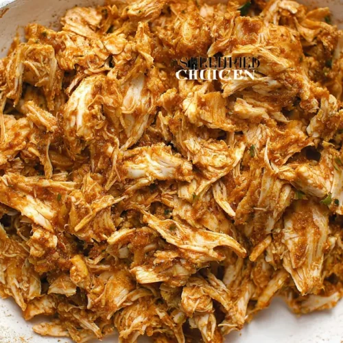 Shredded Chicken Appetizers: Why Try 2 New Bites? 2 A close-up of savory shredded chicken appetizers arranged on a platter.