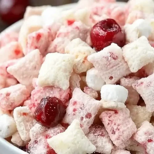 Cherry Cheesecake Puppy Chow: 7 Quick Tips 2 A bowl of cherry cheesecake puppy chow, featuring a delightful blend of colors.