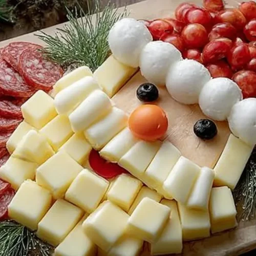 A table laden with various Christmas food dishes, ready for a holiday dinner