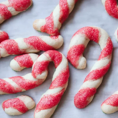 Candy Cane Cookies: 9 Festive Decorating Ideas 2 A plate with beautifully swirled red and white candy cane cookies, ready for the holidays.