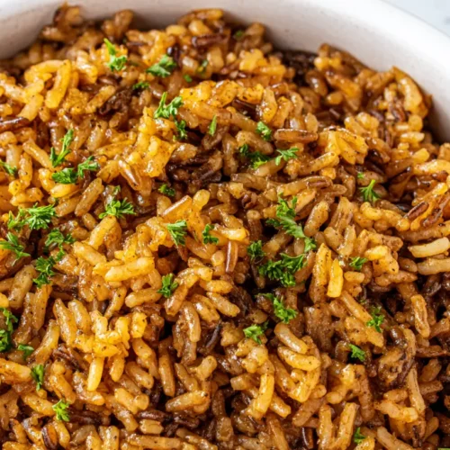 Popeyes Cajun Rice Copycat: 10 Minute Meal Idea 2 A bowl of Popeyes Cajun rice copycat recipe, rich in flavor and texture.
