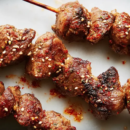 Spicy Cumin Chicken Heart Skewers: 6 Must-Try Marinades 2 Close-up of spicy cumin chicken heart skewers, grilled to perfection