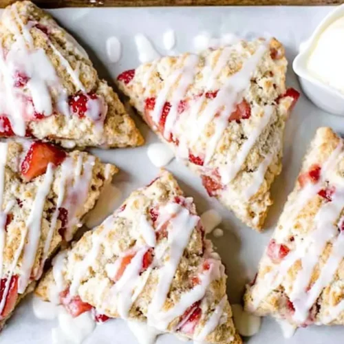 Strawberry Scones Recipe: 10 Reasons to Bake Today 2 A basket of freshly baked strawberry scones on a wooden table.