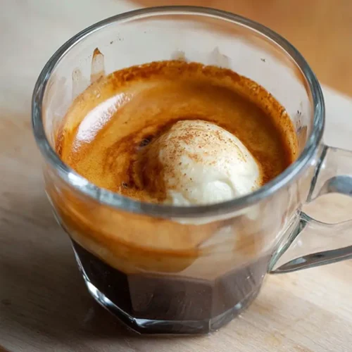 Collection of espresso recipes displayed in a modern kitchen setting