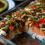 Oven-baked spicy salmon sushi with a creamy topping