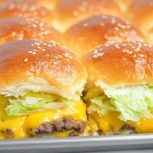 A tray of homemade Big Mac sliders, freshly baked and ready to serve.