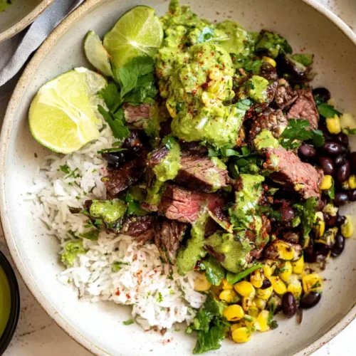A vibrant cilantro lime steak bowl with fresh ingredients.
