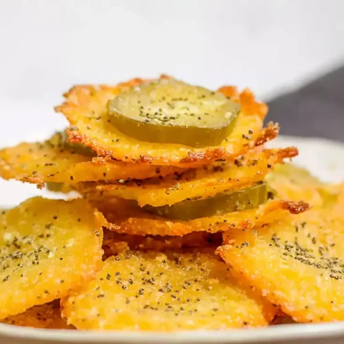 Crispy Pickle Cheese Bites: 5 Easy Party Appetizers 2 Golden brown crispy pickle cheese bites on a serving platter