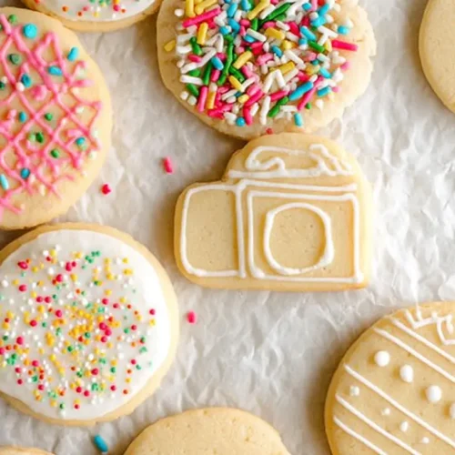 A plate of delightful sugar cookies, beautifully decorated.