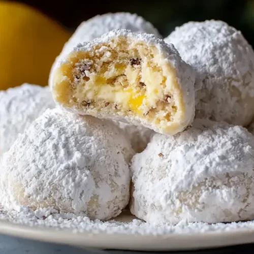 Lemon Cream Snowball Cookies: 6 Simple Ways to Enjoy 2 Delicious Lemon Cream Snowball Cookies dusted with powdered sugar