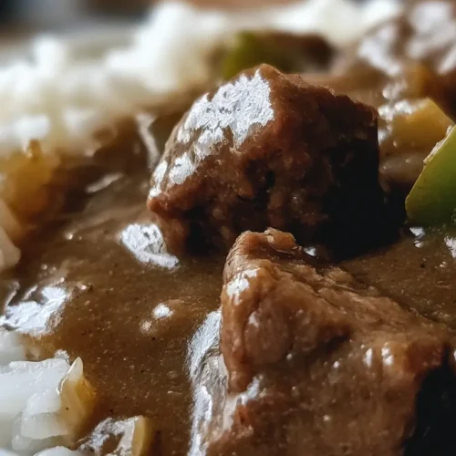 Pioneer Woman Beef Tips And Gravy: 2 New Twists 2 A steaming bowl of Pioneer Woman Beef Tips And Gravy ready to be served over noodles.