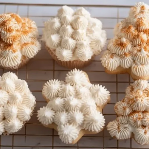 Powdered Sugar Frosting: 10 Minute Magic 2 A close-up of smooth, white powdered sugar frosting in a mixing bowl.