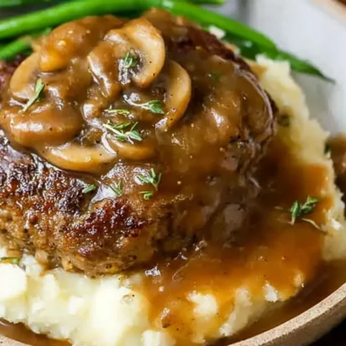 Salisbury Steak And Gravy: 9 Reasons You'll Love It 2 A serving of Salisbury steak and gravy with mashed potatoes.