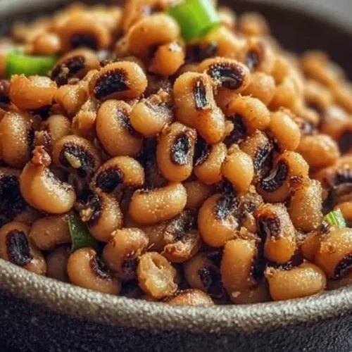 Crispy Air Fryer Black Eyed Peas: The 1 Secret Ingredient 2 A close-up of crispy air fryer black eyed peas in a bowl, perfectly golden brown