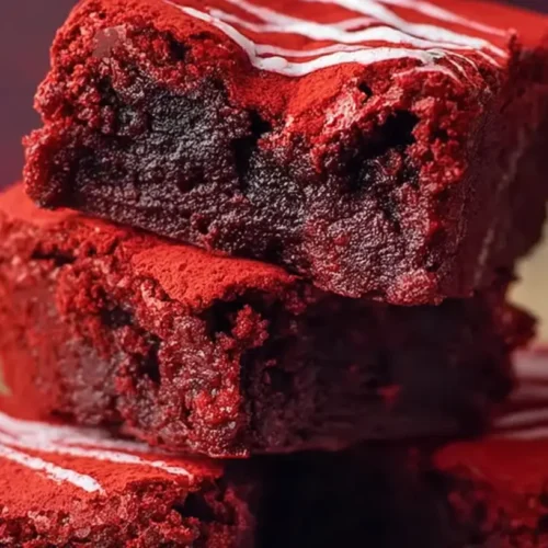 Fudgy Red Velvet Brownies: Why 1 is Perfect 2 Close-up of decadent fudgy red velvet brownies with white chocolate swirls