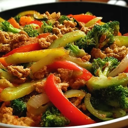 Healthy Turkey Vegetable Stir-Fry: 6 Ways to Spice It Up 2 A vibrant Healthy Turkey Vegetable Stir-Fry in a large pan