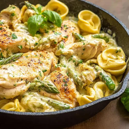 Chicken Pesto Tortellini Skillet — high-protein pasta meal: Why It's a 10/10! 2 A vibrant chicken pesto tortellini skillet showcasing a high-protein pasta meal.