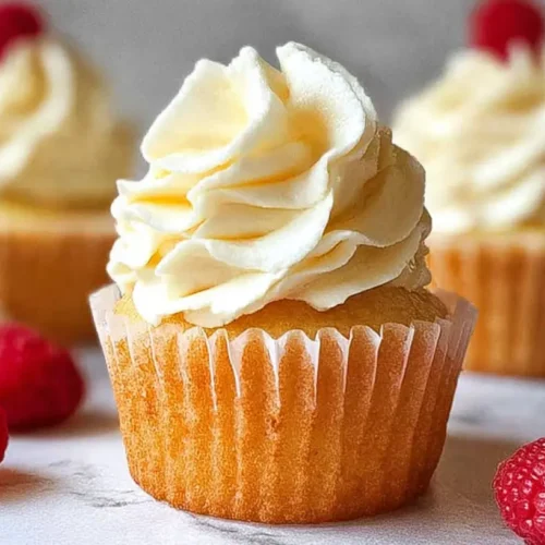 Easy Vanilla Cupcakes: Master 4 Simple Baking Secrets 2 Deliciously frosted easy vanilla cupcakes arranged neatly on a serving tray