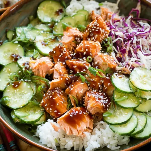 Sesame Ginger Salmon Bowl — rice + cucumbers + quick sauce: 10x Better 2 A Sesame Ginger Salmon Bowl with wild rice, sliced cucumbers, and a quick sauce.