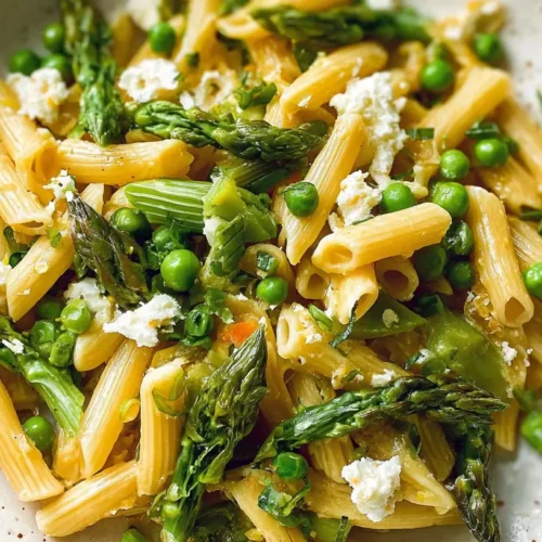 Spring Veggie Pasta Dinner: 2 Delicious Ways 2 A vibrant bowl of spring veggie pasta dinner with fresh seasonal vegetables.