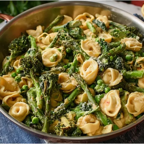 Tortellini Primavera — loaded with spring vegetables: The 1 best recipe! 2 A colorful bowl of Tortellini Primavera, brimming with fresh spring vegetables.