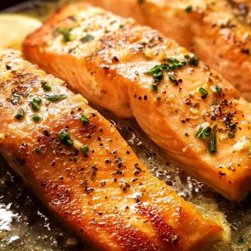 Easy Garlic Butter Salmon: 5 Dinner Ideas 2 Cooked Easy Garlic Butter Salmon fillet on a pan, golden brown