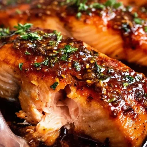 Honey Garlic Salmon Fillet: Why 1 is a Must-Try 2 A perfectly cooked honey garlic salmon fillet, glistening and golden brown.