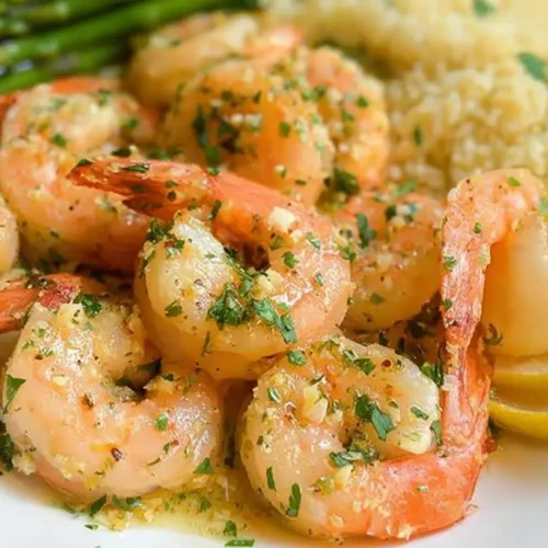 Lemon Garlic Shrimp Plate: 1 Perfect Weeknight Meal 2 A vibrant lemon garlic shrimp plate served with fresh herbs.