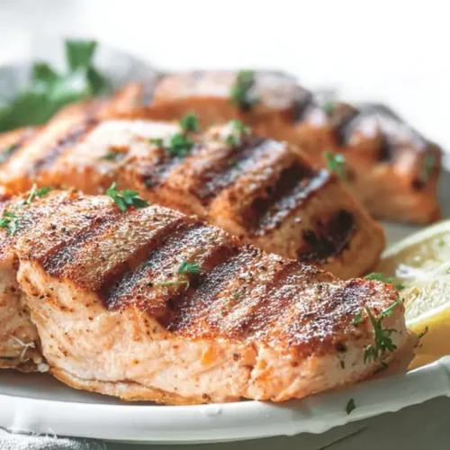 Simple Grilled Salmon Recipe: Top 1 Dish for Dinner 2 A simple grilled salmon fillet with herbs and lemon.