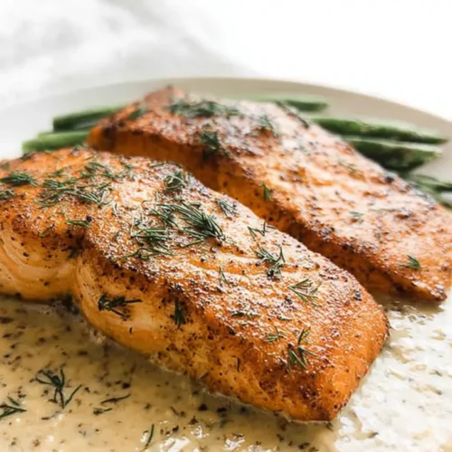 A perfectly cooked pan seared salmon, ideal for beginners, with crispy skin.
