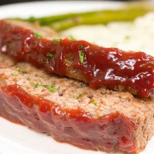 Traditional Meatloaf with Brown Sugar Glaze: Why 3 Ways 2 A traditional meatloaf with a rich brown sugar glaze, freshly baked and ready to serve.