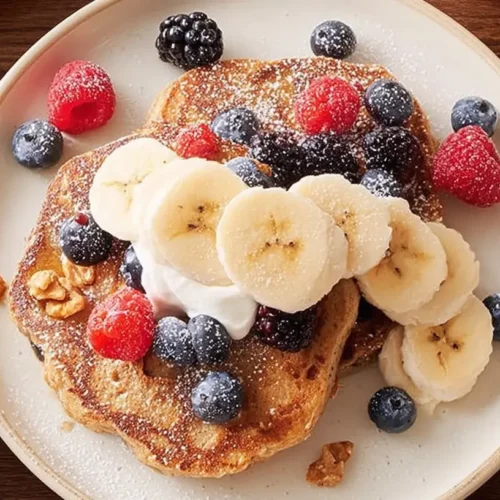 Easy Breakfast Ideas to Start the Day: How to Make 7 Meals 2 A vibrant flat lay showcasing various easy breakfast ideas like fruit, yogurt, and toast.