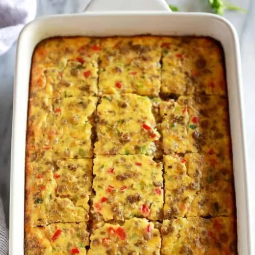 A hot and easy breakfast casserole, perfect for busy mornings, prepared in a baking dish.