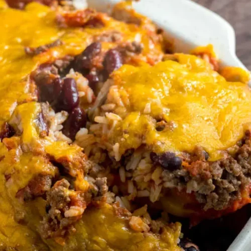 Shipwreck Casserole: How to Make 1 Easy Meal 2 A bubbling shipwreck casserole in a baking dish, fresh from the oven.